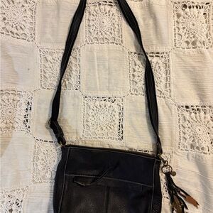 Classic Black Leather Crossbody with Tassel Detail